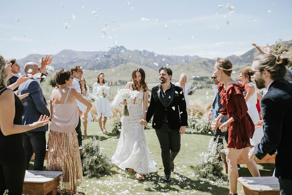 Confetti for the newlyweds - photo by Alpine Image Co.